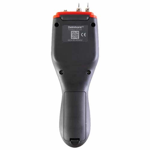 Delmhorst BDX-30 moisture meter rear view showing the brand logo, CE mark, serial label and battery compartment.
