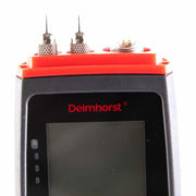 Delmhorst BDX-30 moisture meter top closeup showing the red electrode cap, contact pins and connector port above the display.