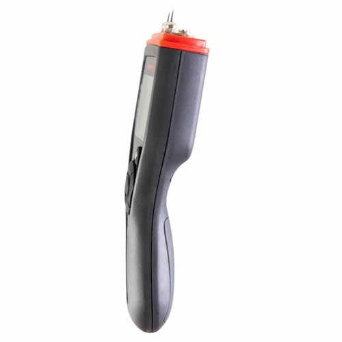 Delmhorst BDX-30 wood moisture meter shown from the side, highlighting the contoured grip and measuring pins at the top.