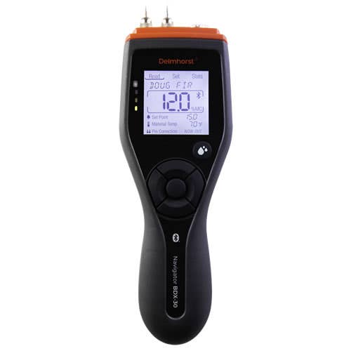 Delmhorst BDX-30 wood moisture meter front view showing the backlit display reading a Douglas fir moisture value with Bluetooth icon and navigation pad.