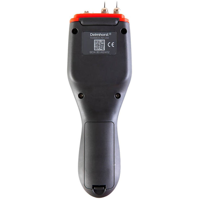Delmhorst JX-30 Navigator wood moisture meter back view showing the label, CE mark and battery compartment.