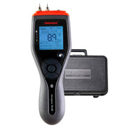 Delmhorst JX-30 Navigator wood moisture meter showing the backlit display reading and the black carrying case.
