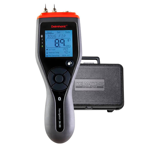 Delmhorst JX-30 Navigator wood moisture meter showing the backlit display reading and the black carrying case.
